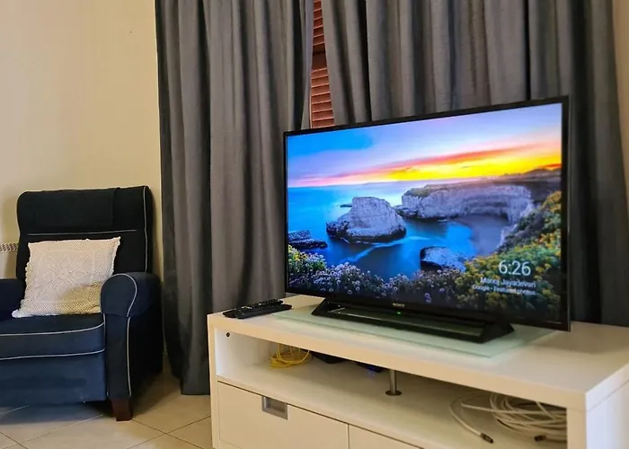 Prázdninový dům Mythos Down Town House